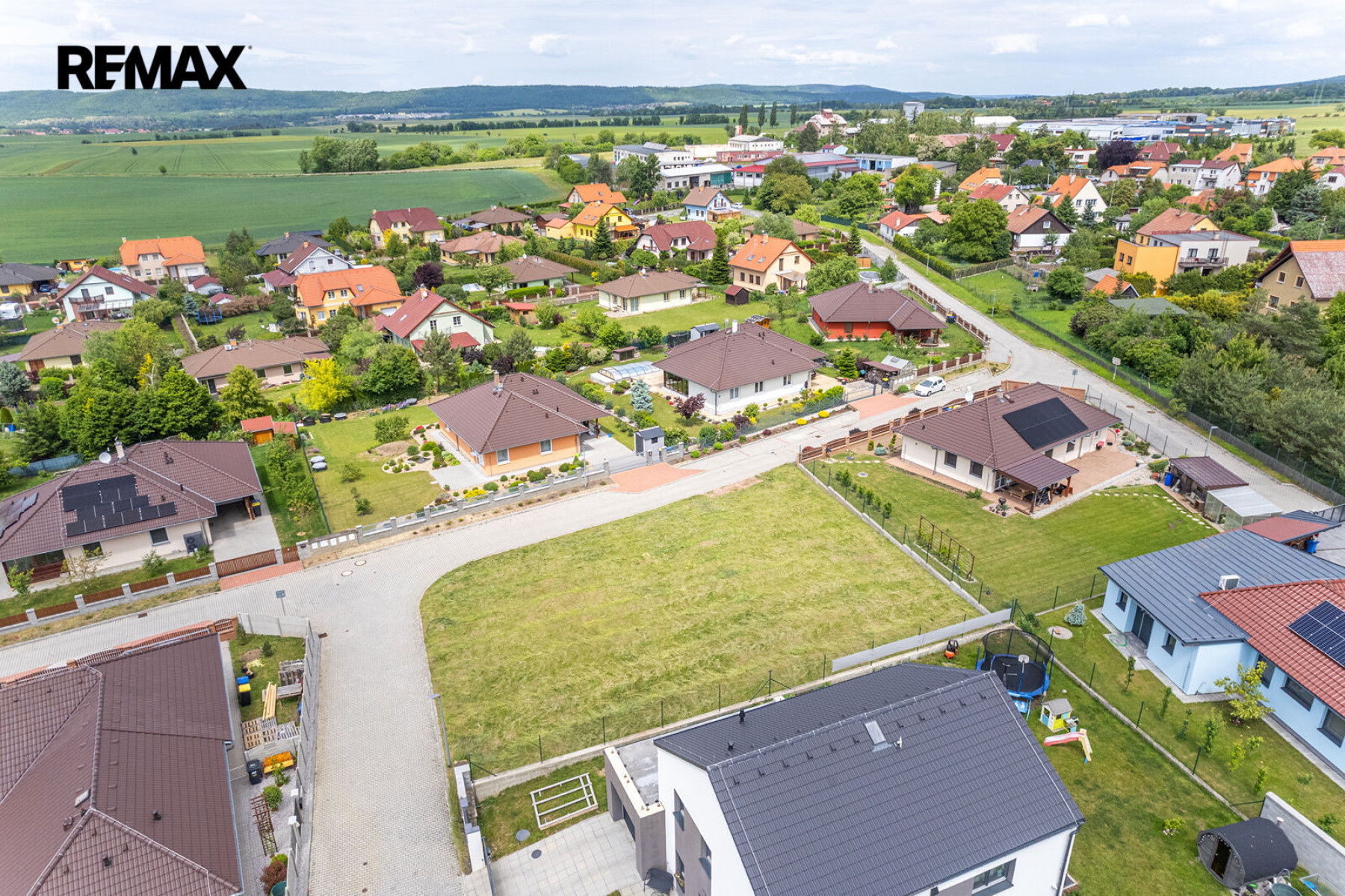 Prodej stavebního pozemku 810 m², Hostomice