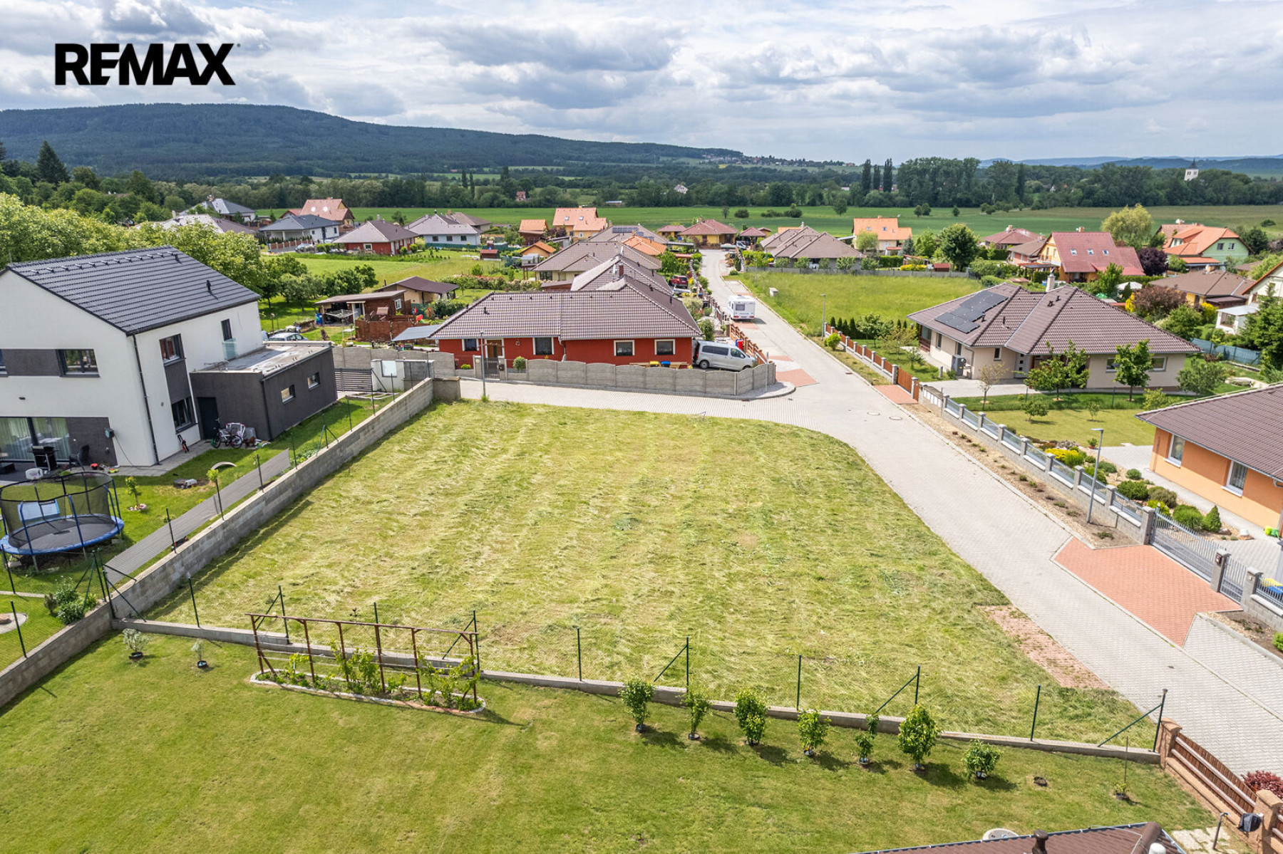 Prodej stavebního pozemku 810 m², Hostomice
