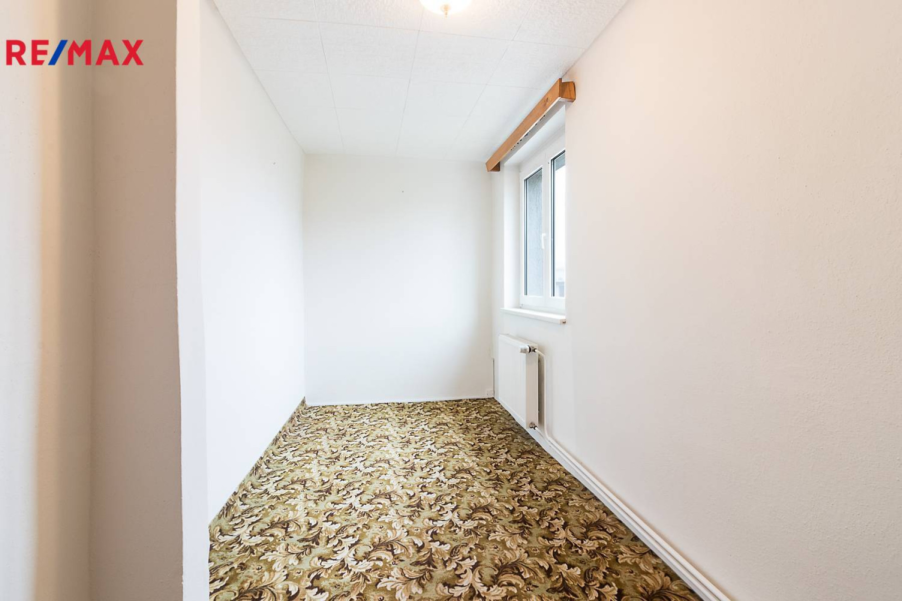 Prodej rodinného domu s velkou garáží ve Stodůlkách