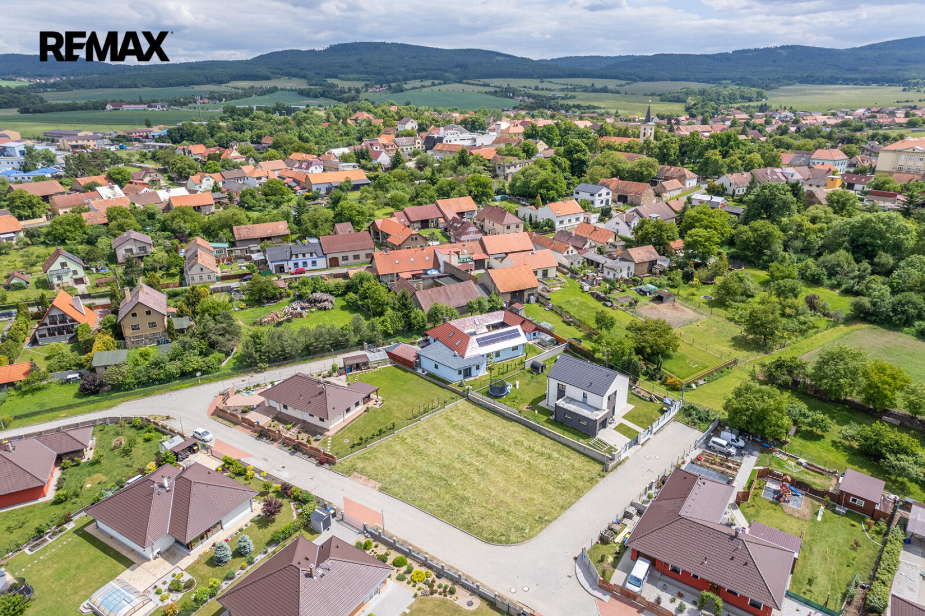 Prodej stavebního pozemku 810 m², Hostomice