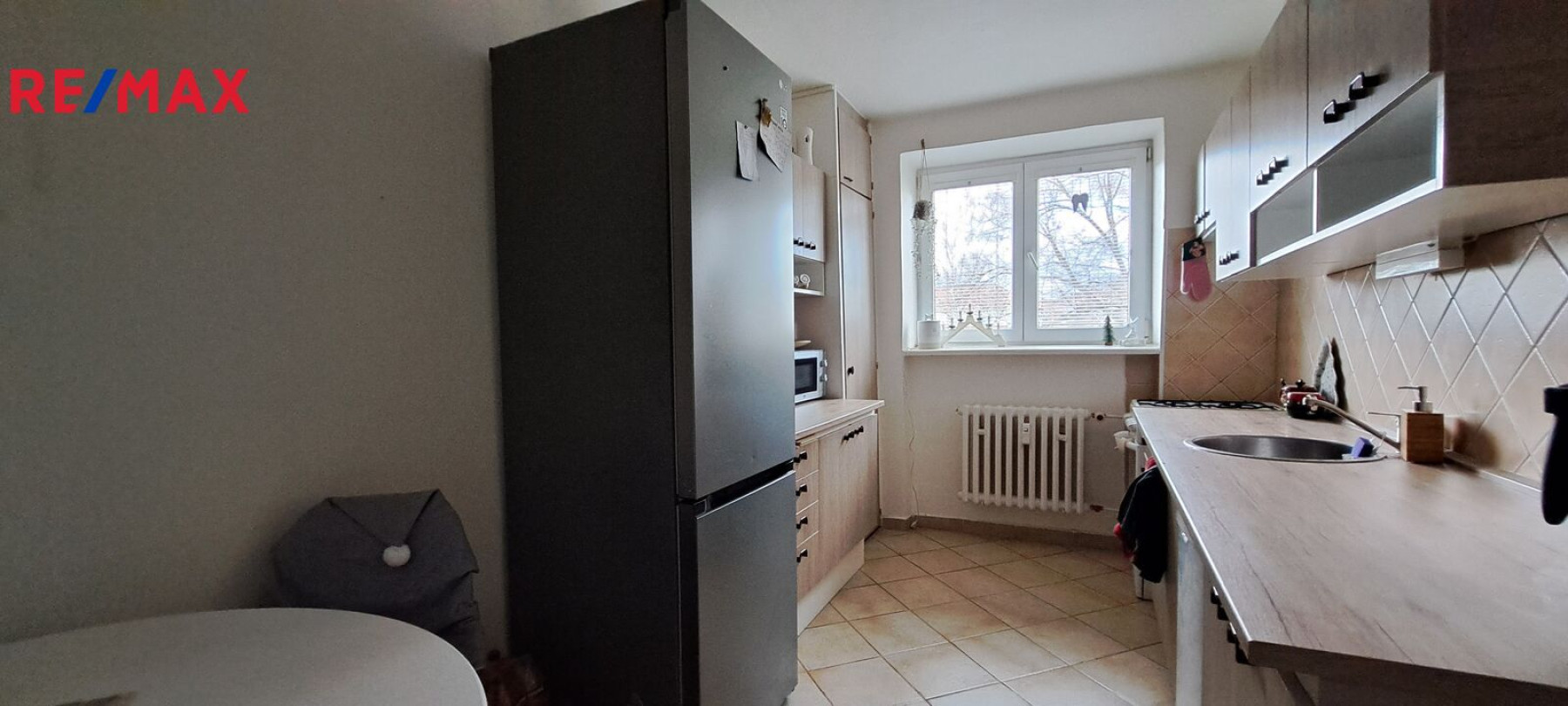 Prodej bytu 3+1/L a sklepem v Mostě