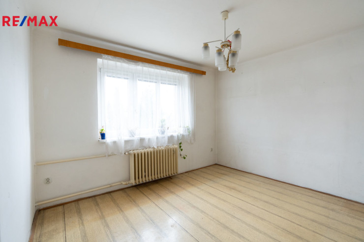 Dům se samostatně stojící garáží ve skvělé lokalitě